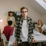 Young professionals engaging in a collaborative meeting in a modern office setting.